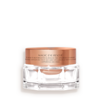 An award-winning, fawn-coloured eye cream in a petite glass jar with a gold-coloured lid.
